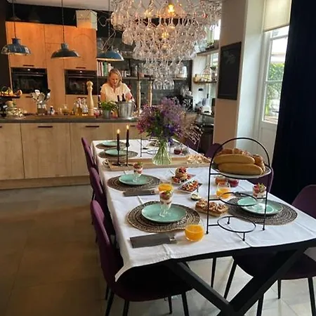 Geliefd Couette-café *